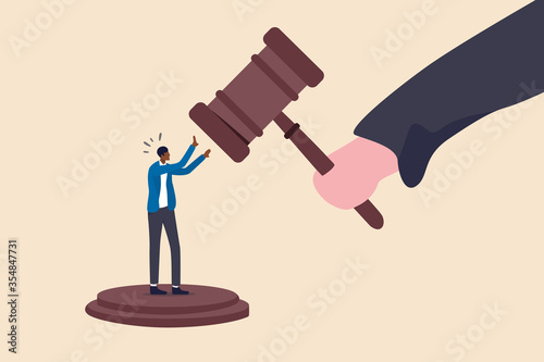 Social inequality, discrimination, injustice and unfairness for black people or racism on people of color concept, judge using huge justice hammer to punish small black people or African American man. photo