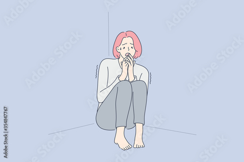 Despair, frustration, fear, mental stress concept. Young terrified scared girl or woman cartoon character sitting in corner and shaking from fear. Family violence problem or psychological phobia.