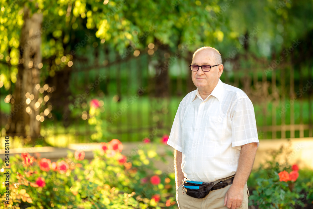 Senior Caucasian man with thoughtful expression outdoor. Senior Caucasian man with thoughtful expression outdoor.