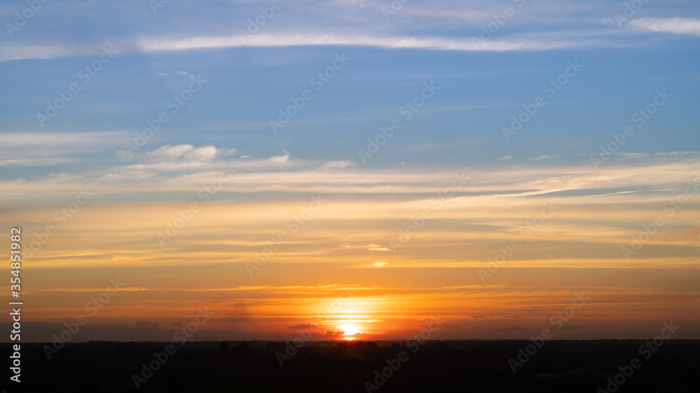 Colorful of clouds and blue sky with sun set for nature textured background