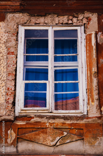 Closed antique window in the city