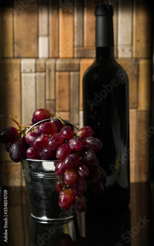 bottle of wine and grapes