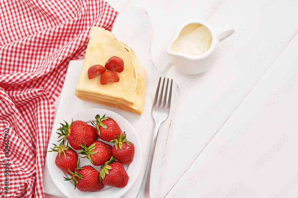 Strawberries and pancakes. Pancakes with strawberries. Romantic breakfast. Valentine's Day. Greeting Card Mother's Day. Breakfast in hotel room. Maslenitsa. Pancake week. Women's Day Congratulation Strawberries and pancakes. Pancakes with strawberries. Romantic breakfast. Valentine's Day. Greeting Card Mother's Day. Breakfast in hotel room. Maslenitsa. Pancake week. Women's Day Congratulation