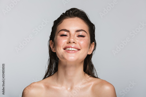 Beauty portrait of an attractive young topless brunette woman