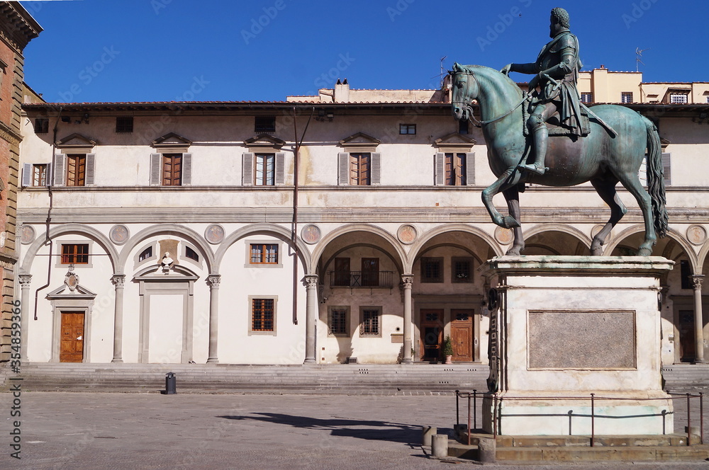 Florence during the covid-19 emergency, equestrian statue of Ferdinando I on Piazza Santissima Annunziata, Florence, Italy