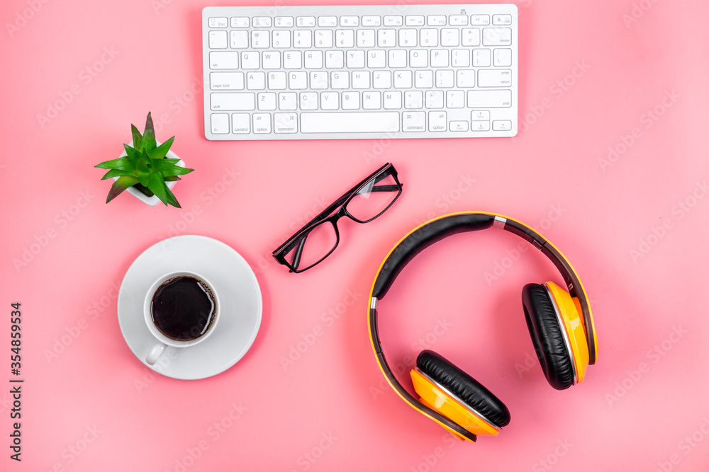Flat lay webinar concept. headphones near laptop top view Flat lay webinar concept. headphones near laptop top view
