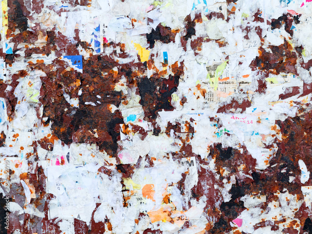 Naklejka premium Torn advertisement posters, may be used as background