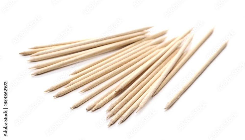 Wooden toothpicks pile isolated on white background Wooden toothpicks pile isolated on white background