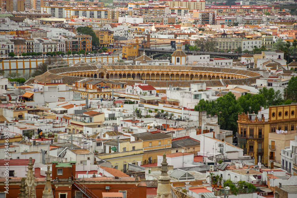 Panoramic view of the city of Seville and Plazas de Toros, Spain.