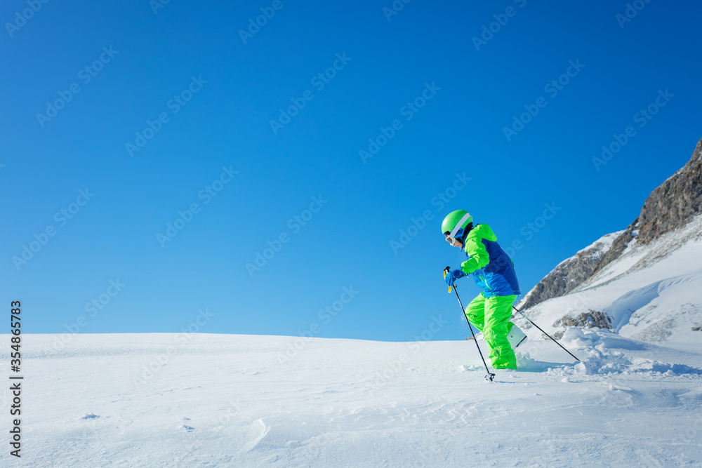 Boy in hiking school having fun in snow winter activity concept