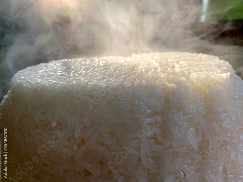 Close up hot sticky rice with smoke after boil.