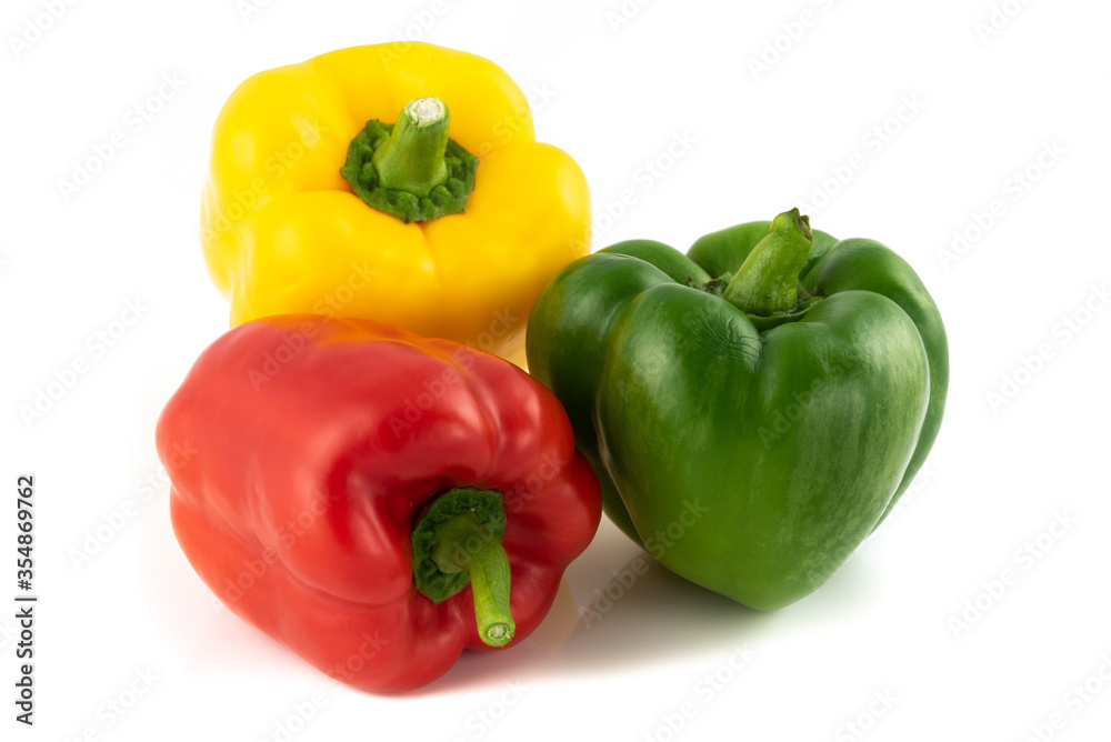 Trio of Bell Peppers close up isolated on a white background. Trio of Bell Peppers close up isolated on a white background.