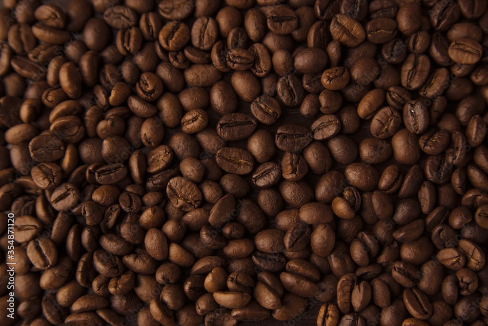 Cup, coffee, cinnamon on a brown background Cup, coffee, cinnamon on a brown background