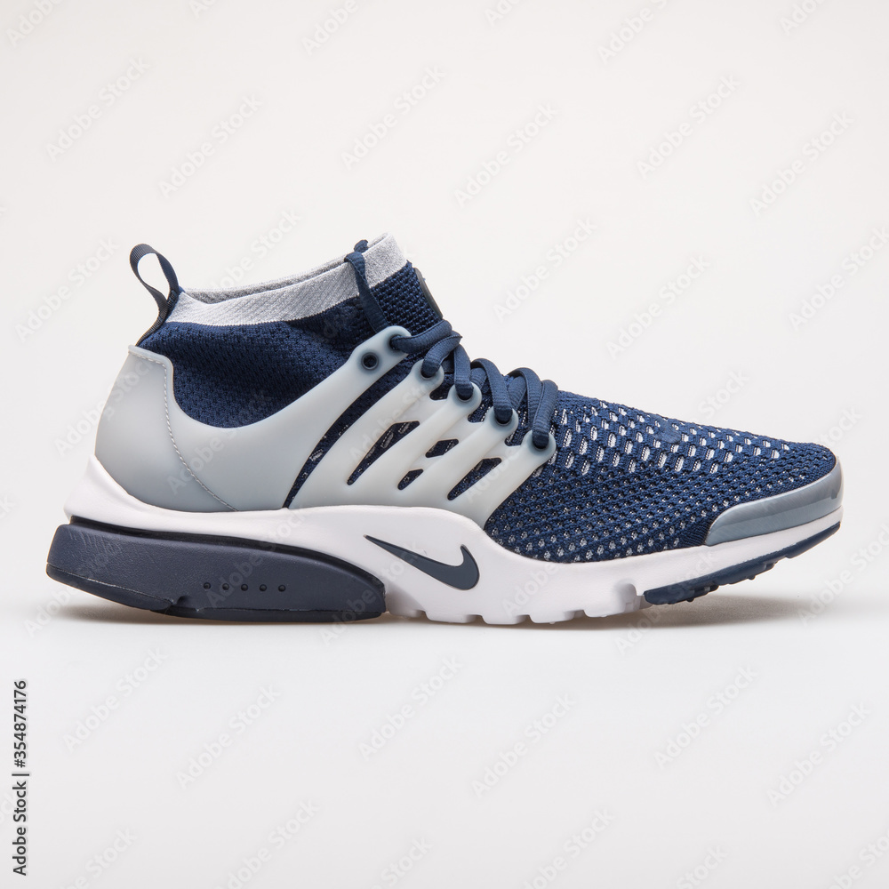 VIENNA, AUSTRIA - AUGUST 28, 2017: Nike Air Presto Flyknit Ultra navy blue  and grey sneaker on white background. Stock Photo | Adobe Stock