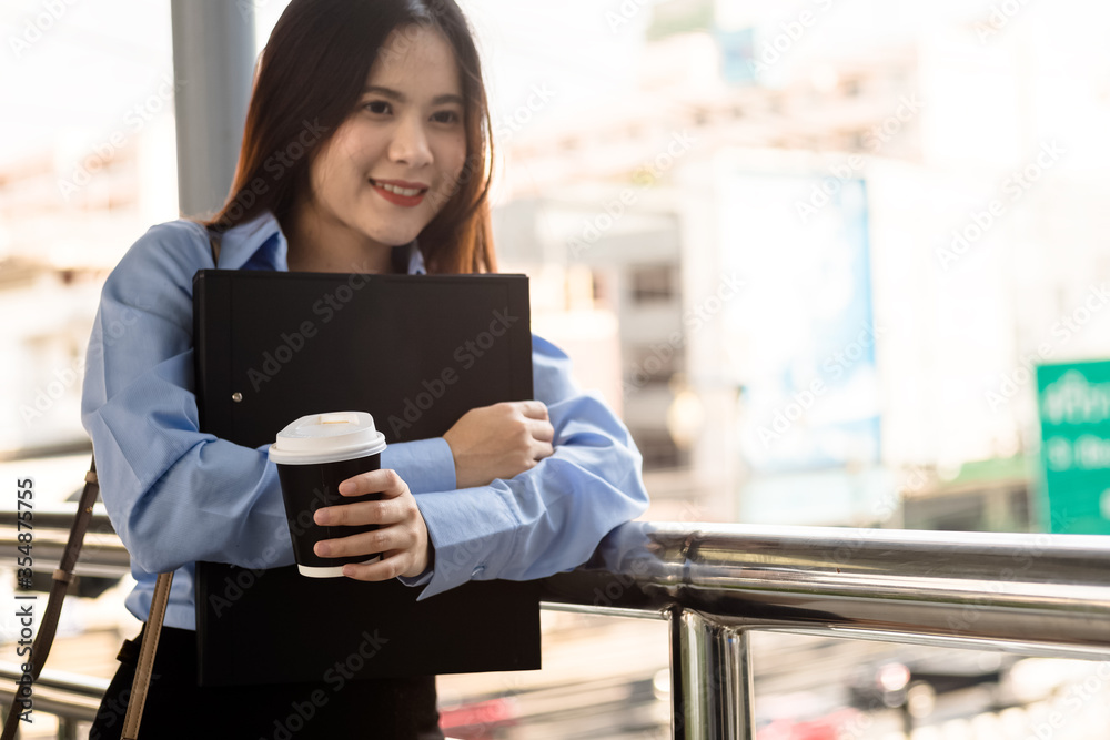 Fototapeta premium Beautiful Woman hold cup of coffee in the morning.