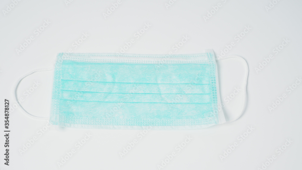 Fototapeta premium Disposable Ear- loop face mask on white background.