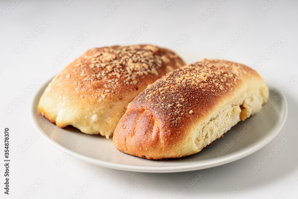Close-up of homemade buns in a gray plate