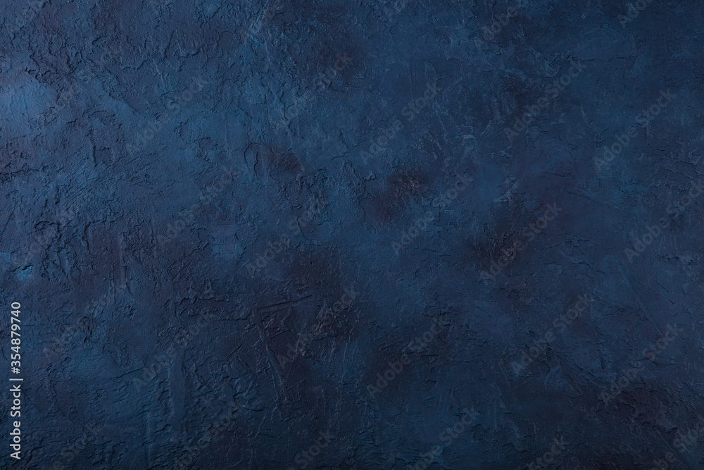Naklejka premium Dark navy blue stone texture background. Top view. Copy space.