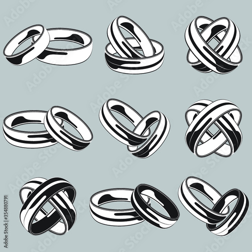 Black and white wedding ring set on isolated background