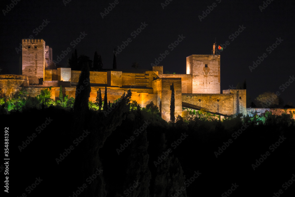 Panoramic night view of the Alhambra in the city of Granada, Spain. Panoramic night view of the Alhambra in the city of Granada, Spain.