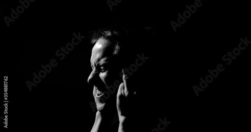 Guy has a very bad headache, rubs his temples, a psychological disorder, abstraction