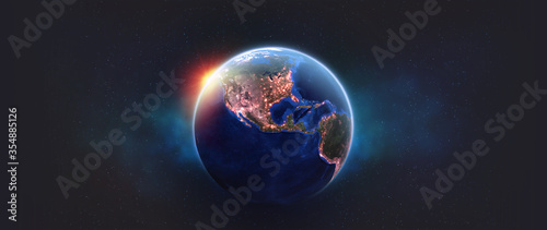 Fototapeta Naklejka Na Ścianę i Meble -  Planet earth in outer space. Night over American continents. Light of night cities in world. Elements of this image furnished by NASA