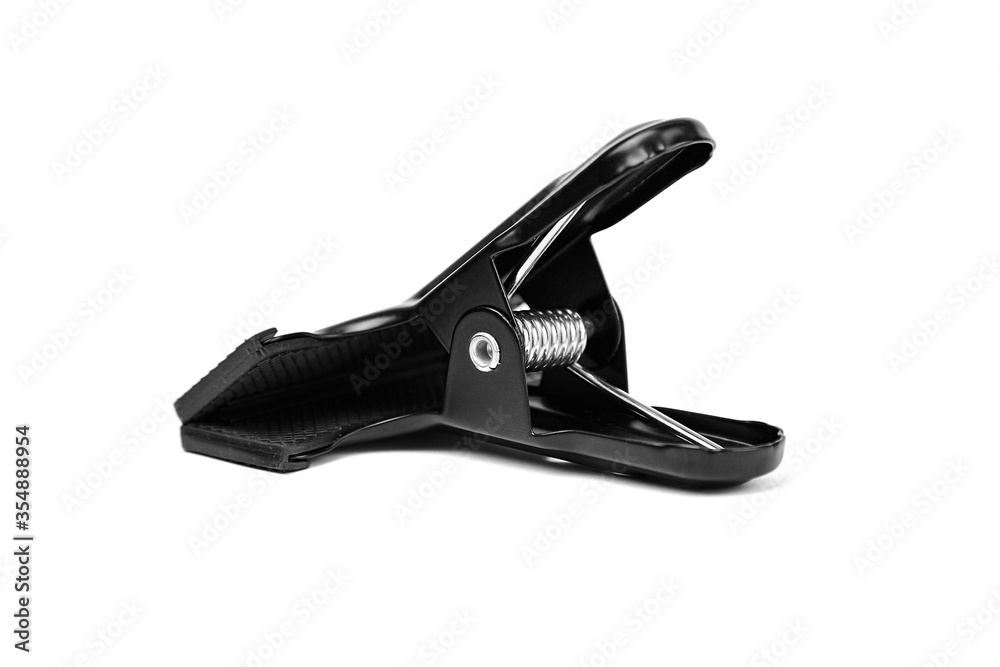 Clamp, spring clip with rubber protective sleeve, isolated on white background Clamp, spring clip with rubber protective sleeve, isolated on white background