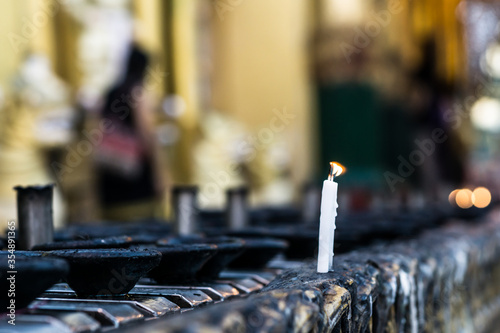candles in the wind at Shwedagon pagoda  Yangon  Myanmar.