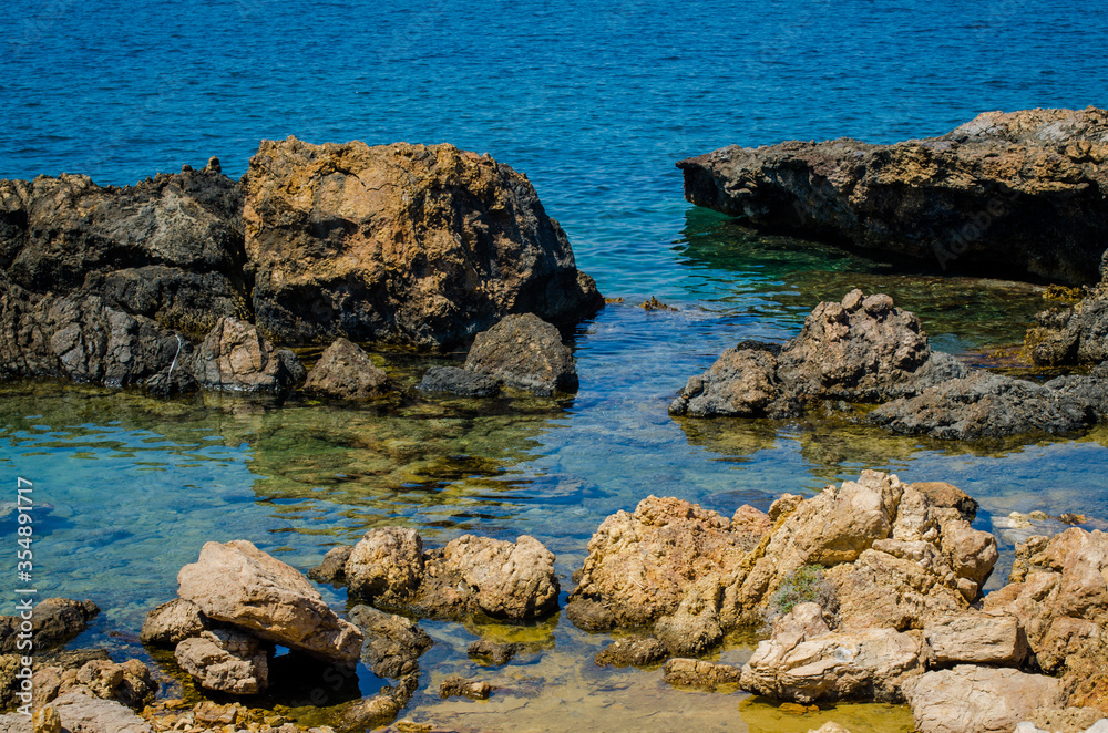 Cliffs and rocks by the sea in the Mediterranean. Cliffs and rocks by the sea in the Mediterranean.