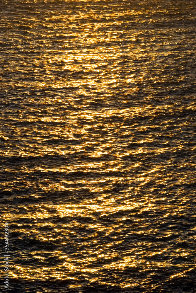 Colorful beautiful sunset on sea summer orange background
