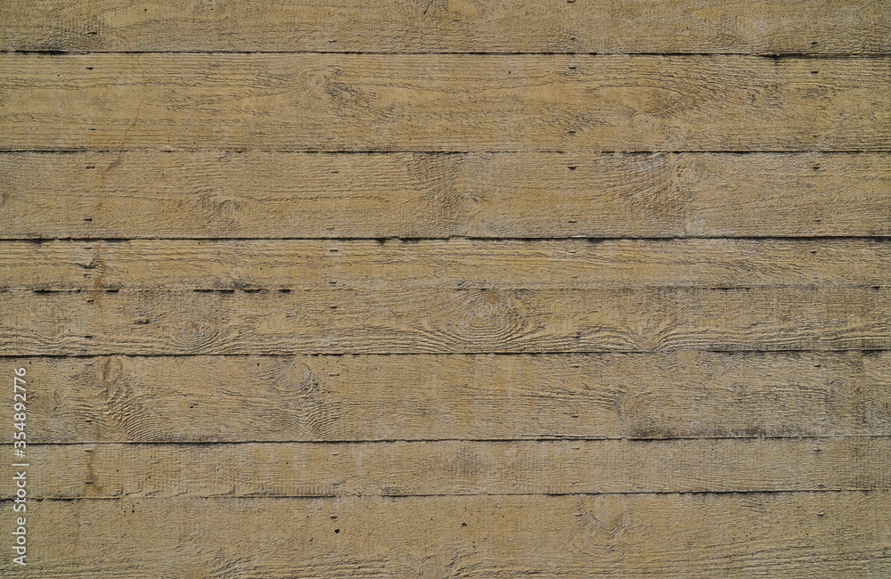 Naklejka premium wood structure in concrete wall