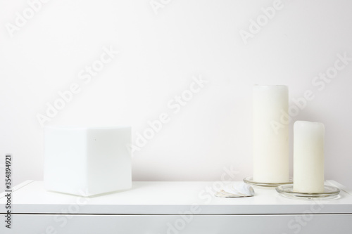 Creative desk with copy space. Empty mint wall. Minimalistic concept with different objects © Naz