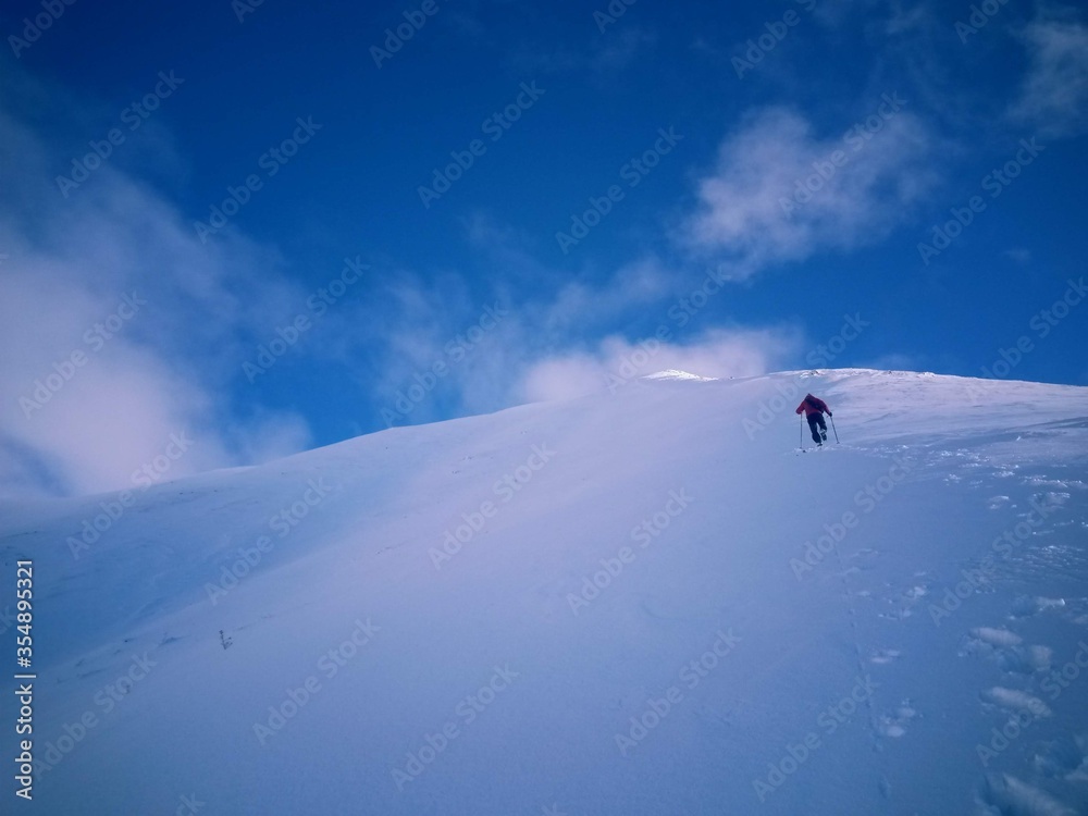 
snowy mountain with beautiful clouds at high altitude 