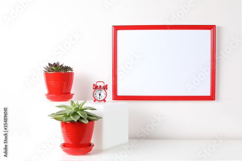 Mock up poster in the interior. White empty canvas with red border isolated on white background with copy space