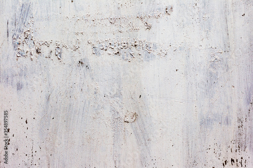 Creative background c cracks and scratches carelessly painted with white paint. Textured background for your concept or project. Great background or texture.