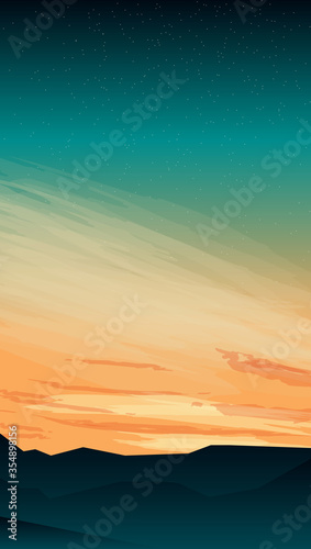 Image of the setting sun on the background of hills