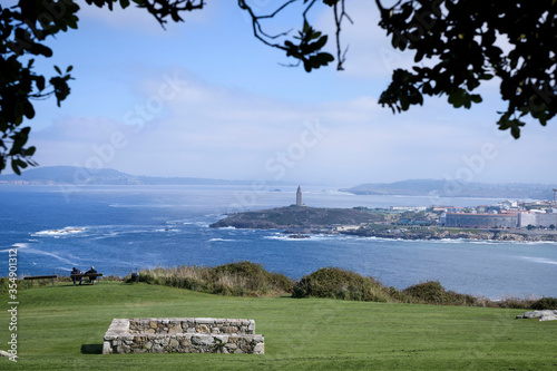 Views of the Tower of Hercules from Monte de San Pedro in La Coruña, Galica, Spain, Europe.