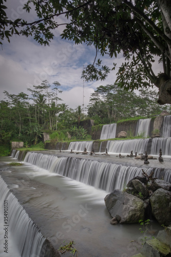 (Grojogan Watu Purbo) Watu Purbo waterfall is a multi-storey river dam and is one of the tourist destinations in Sleman, Yogyakarta. photo