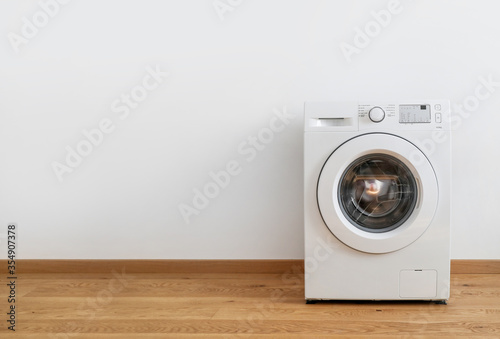 Washing machine on white background