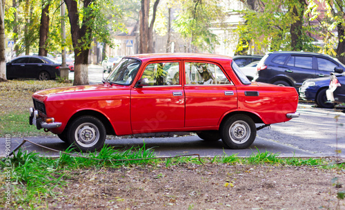 old red car in the street © rubchikova