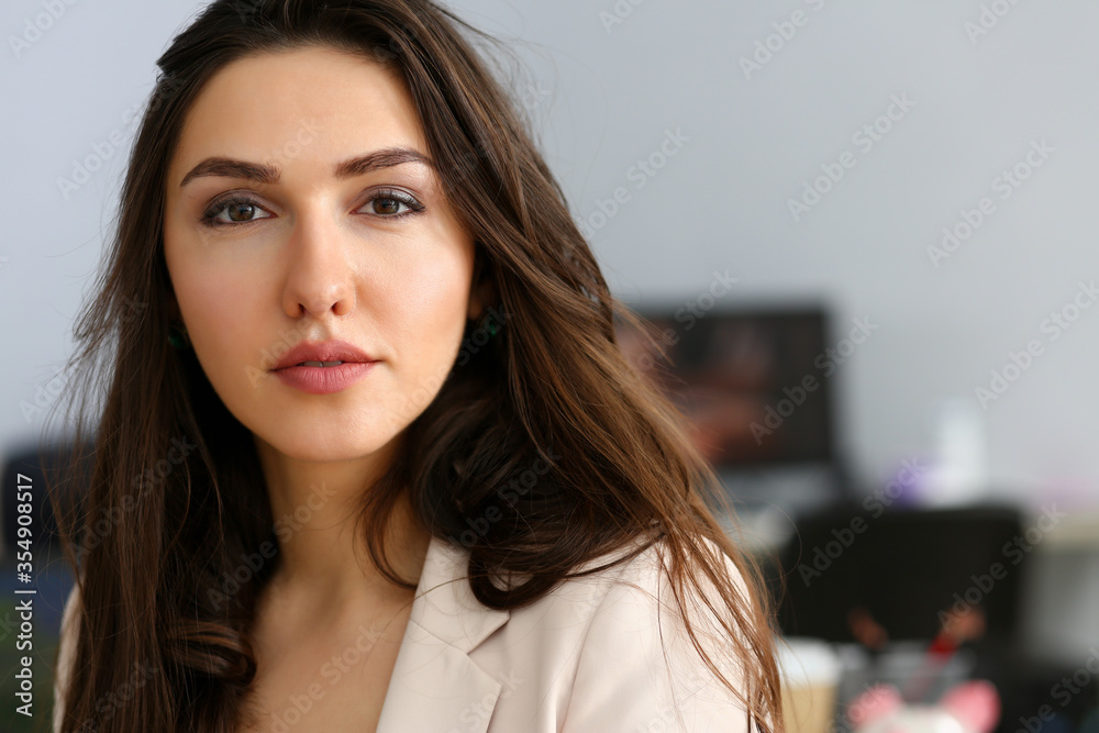Beautiful smiling girl at workplace look in camera Beautiful smiling girl at workplace look in camera