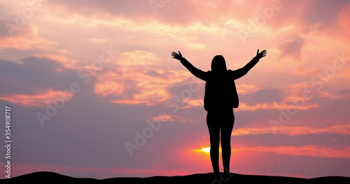 Wallpaper Mural Woman stand with raised arms. Beautiful sky background Torontodigital.ca