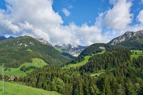 Landscape panorama of green nature  of Swiss Alps near town Gruyere (Gruyères), Fribourg canton of Switzerland © yalcins