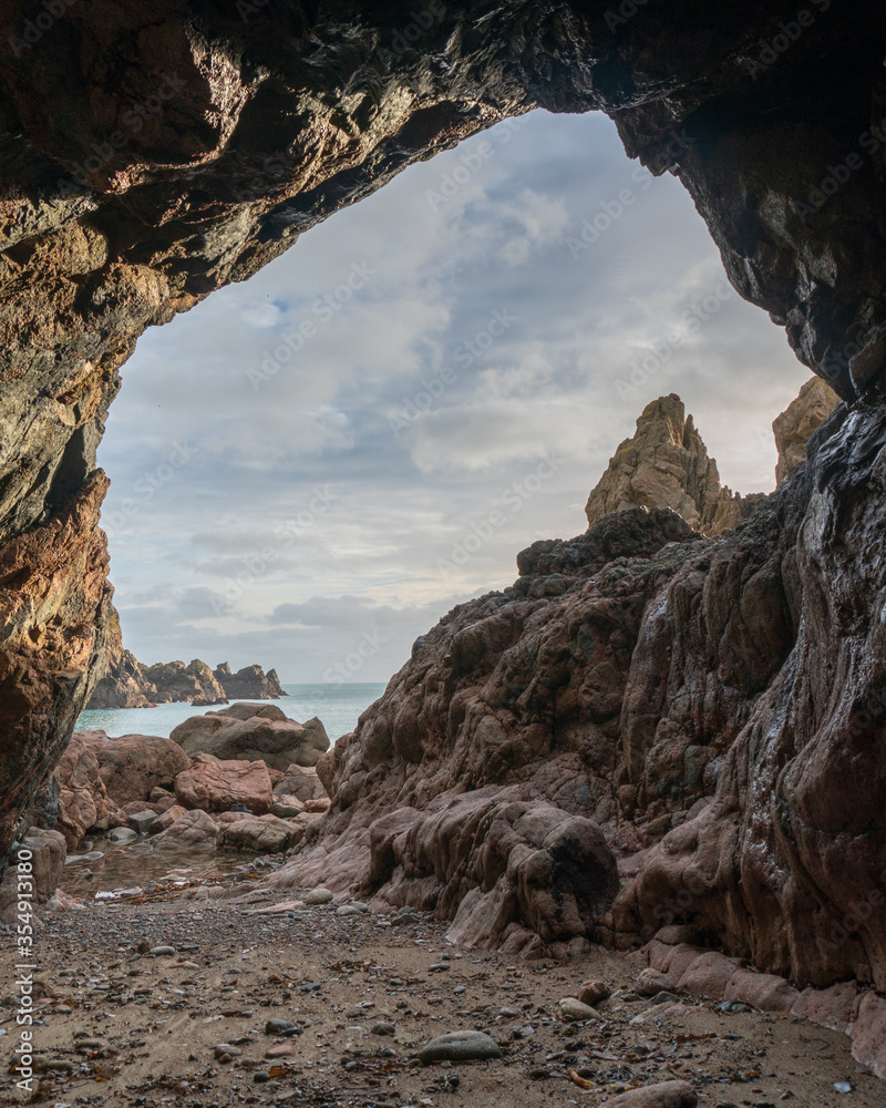 rocks in the sea view from cave in Guernsey 