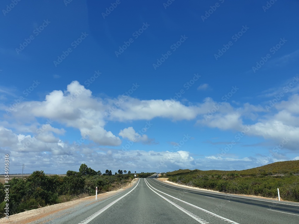 Road in highway with blus sky and cloud in background