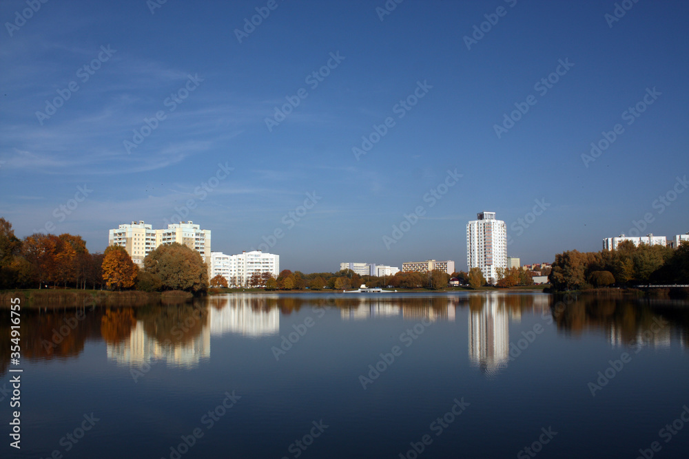 Fototapeta premium Residential buildings on river bank. Minsk, Belarus