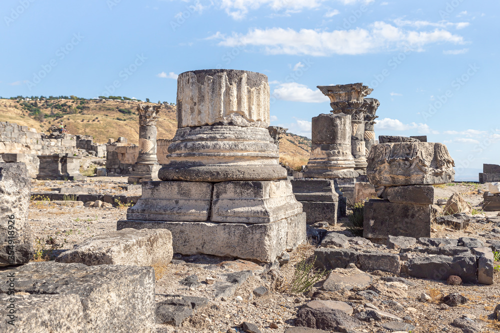 Remains  of columns in ruins of the Greek - Roman city of the 3rd century BC - the 8th century AD Hippus - Susita on the Golan Heights near the Sea of Galilee - Kineret, Israel