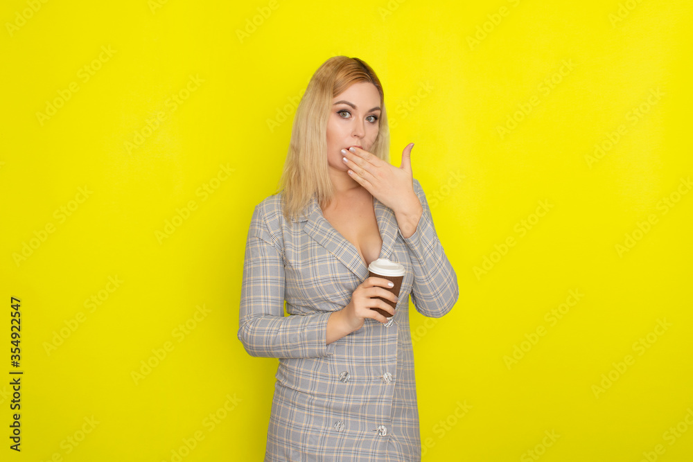 Business blonde woman with cup of coffee Business blonde woman with cup of coffee