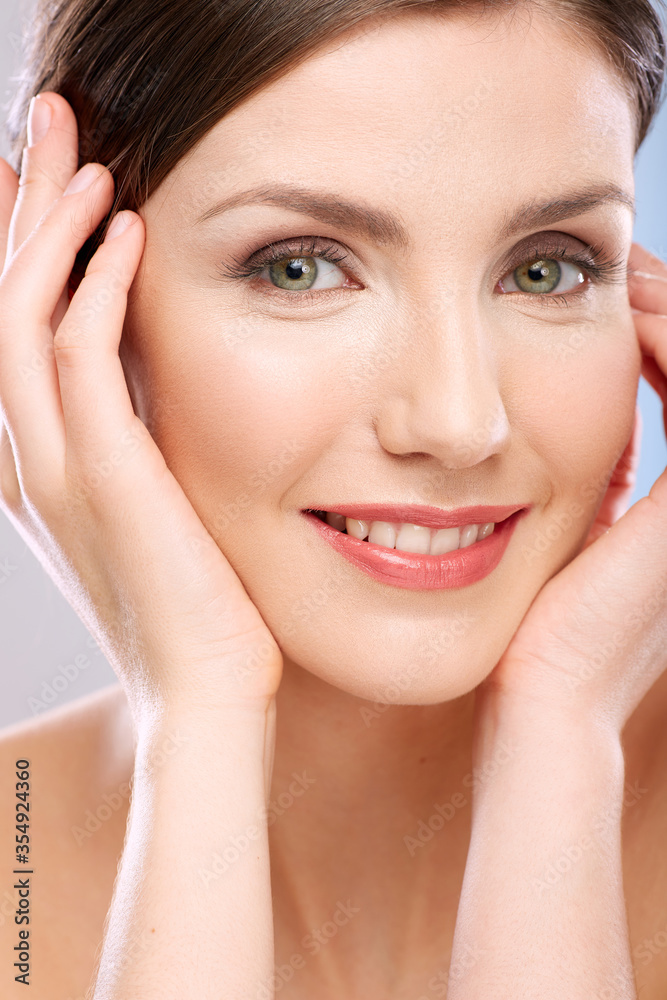 Beauty portrait of young woman touching face. Beauty portrait of young woman touching face.