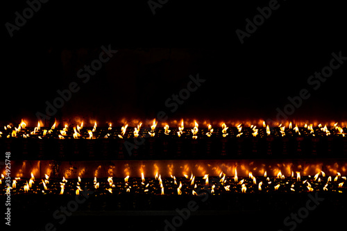 Burning Yak Butter Lamps at Swayambhunath Stupa